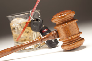 Gavel, Alcoholic Drink &amp; Car Keys on a Gradating to White Background - Drinking and Driving Concept.